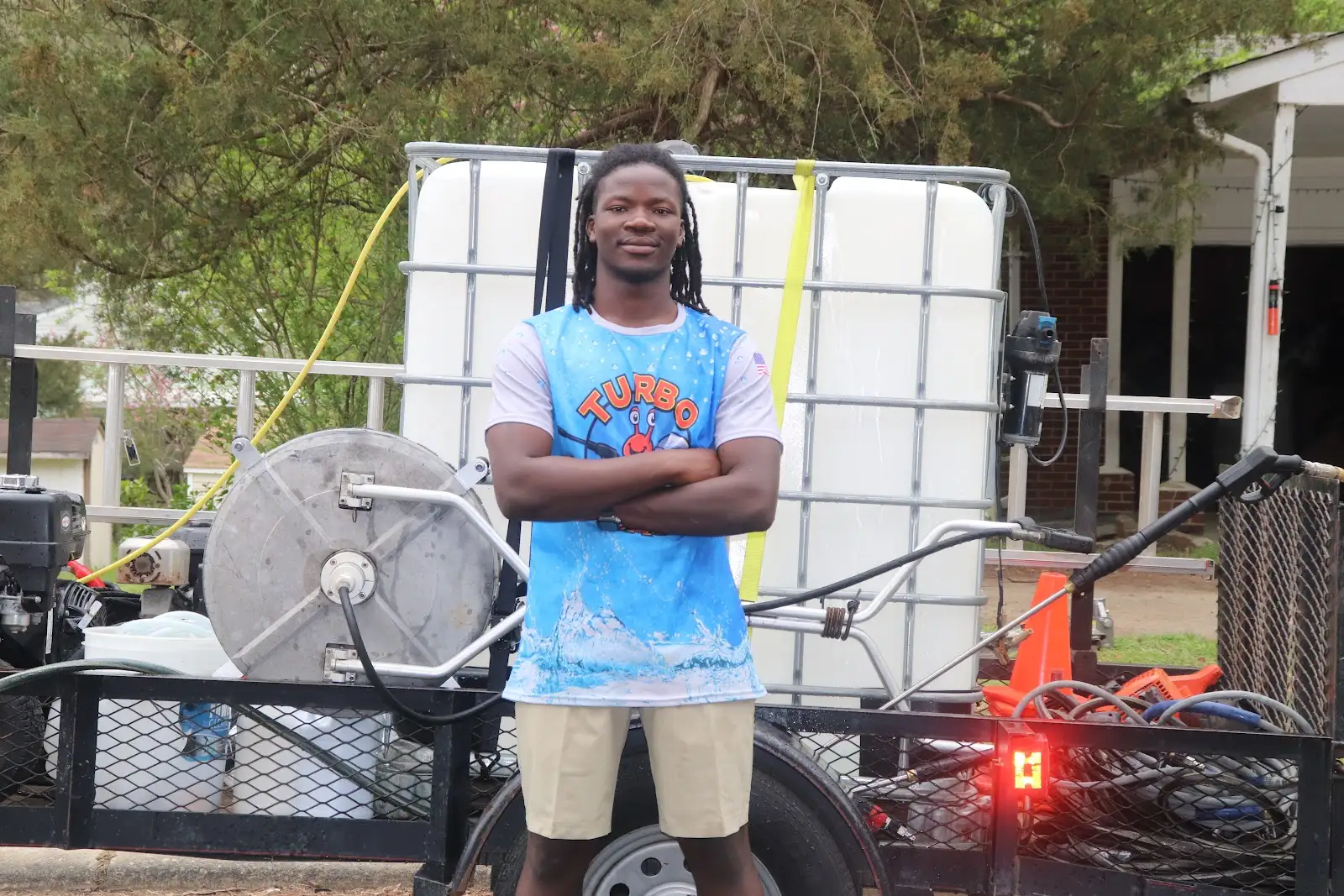 Amos with the Turbo Wash equipment trailer in Raleigh
